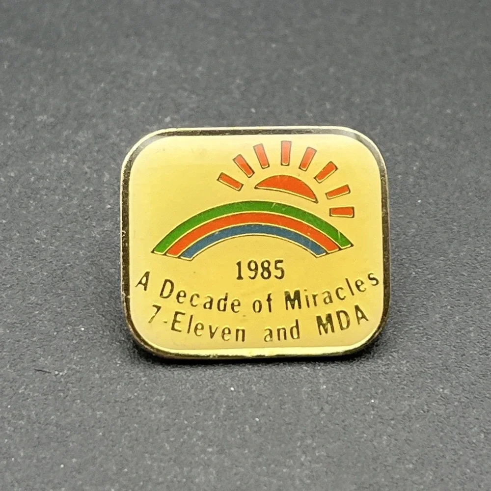 1985 A Decade Of Miracles 7-Eleven And MDA Lapel Hat Pin‎